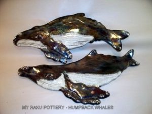 Pottery whales by Maggie Shaw